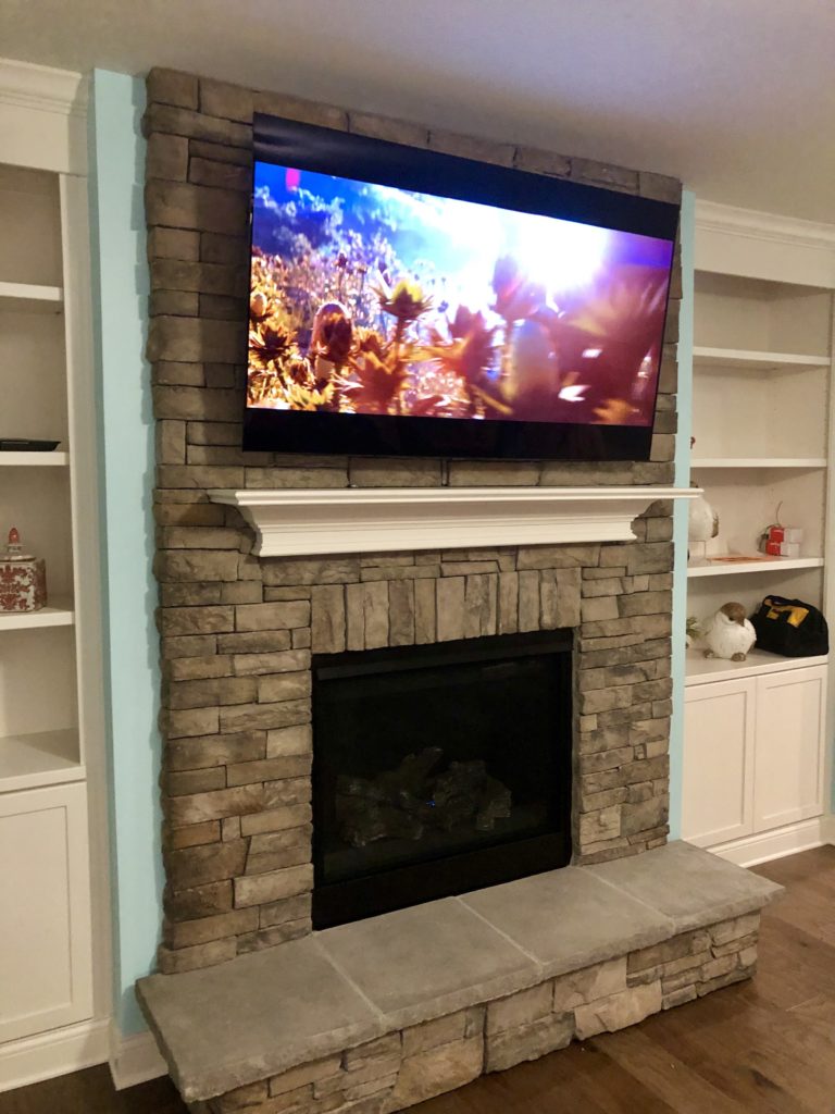 Rock Fireplace TV Installation in KY • LG 65” OLED